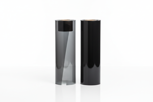 two rolls, one medium and one dark film rolls